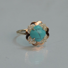 Срібна каблучка з золотими вставками