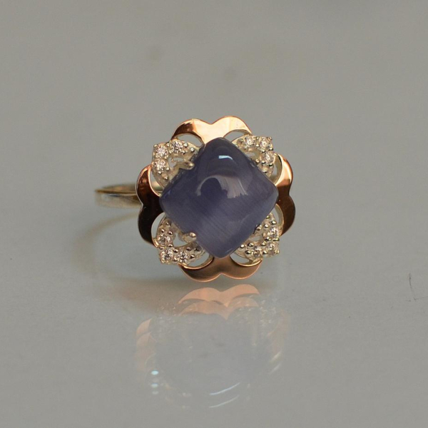 Срібна каблучка з золотими вставками