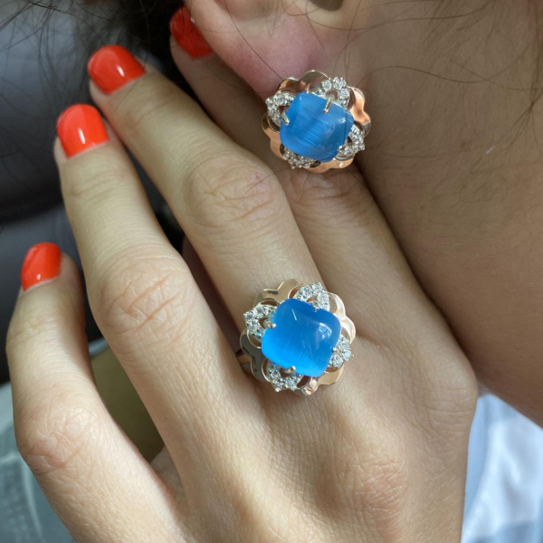 Срібні сережки з золотими вставками