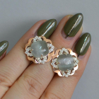 Срібні сережки з золотими вставками