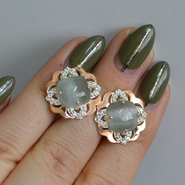 Срібні сережки з золотими вставками