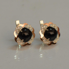 Срібні сережки з золотими вставками