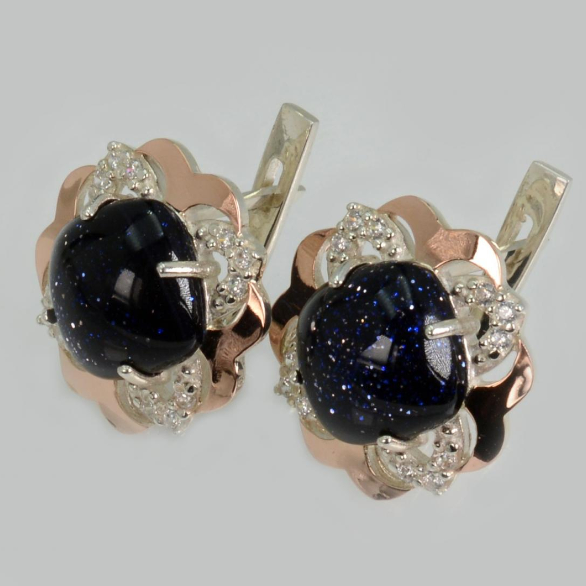 Срібні сережки з золотими вставками