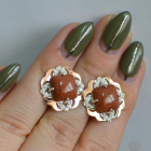 Срібні сережки з золотими вставками