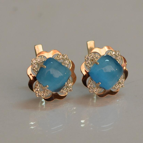 Срібні сережки з золотими вставками