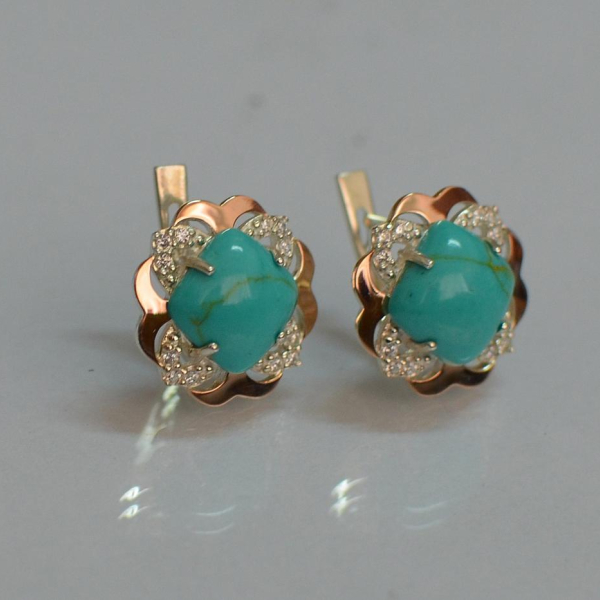 Срібні сережки з золотими вставками