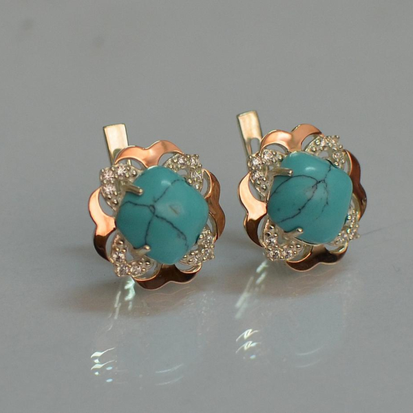 Срібні сережки з золотими вставками