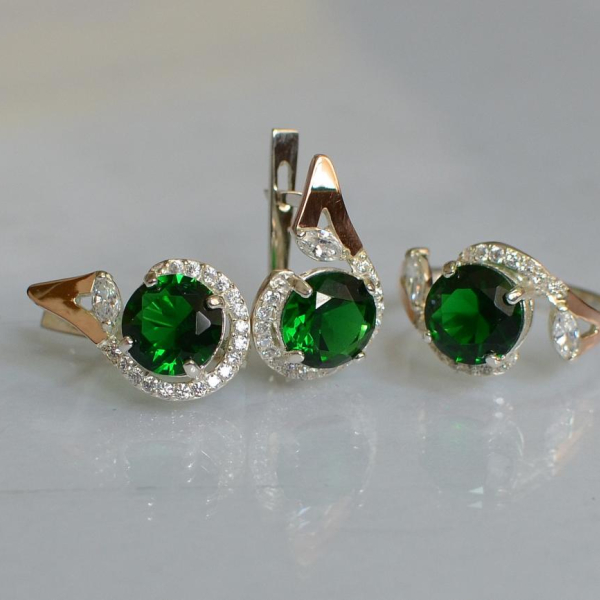 Срібний набір з золотими пластинами