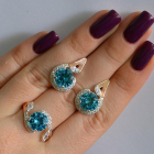 Срібний набір з золотими пластинами