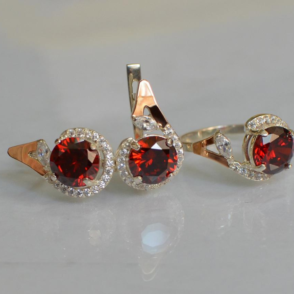 Срібний набір з золотими пластинами