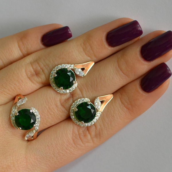 Срібний набір з золотими пластинами