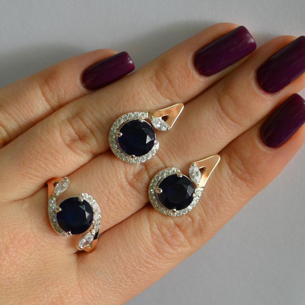 Срібний набір з золотими пластинами