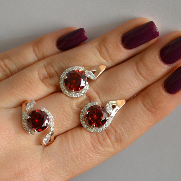 Срібний набір з золотими пластинами