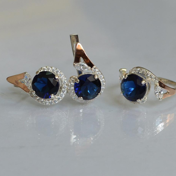 Срібний набір з золотими пластинами