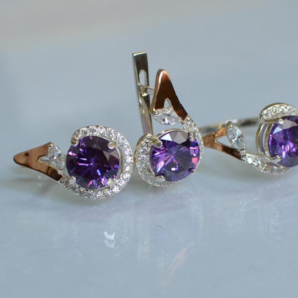 Срібний набір з золотими пластинами