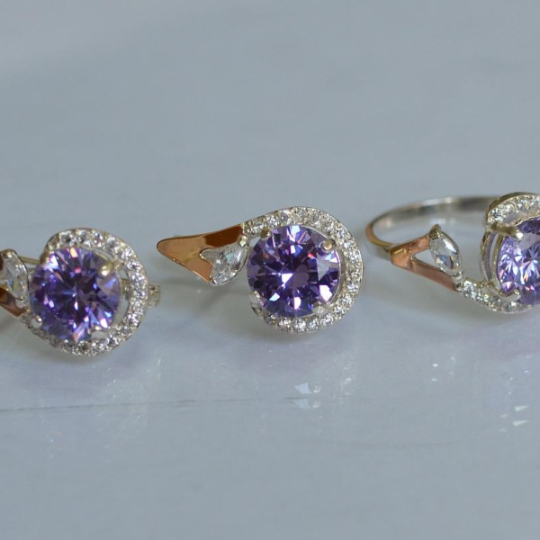 Срібний набір з золотими пластинами