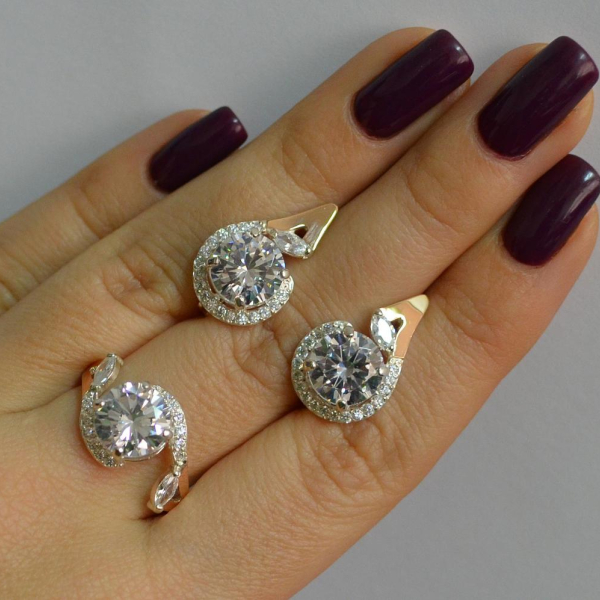 Срібний набір з золотими пластинами