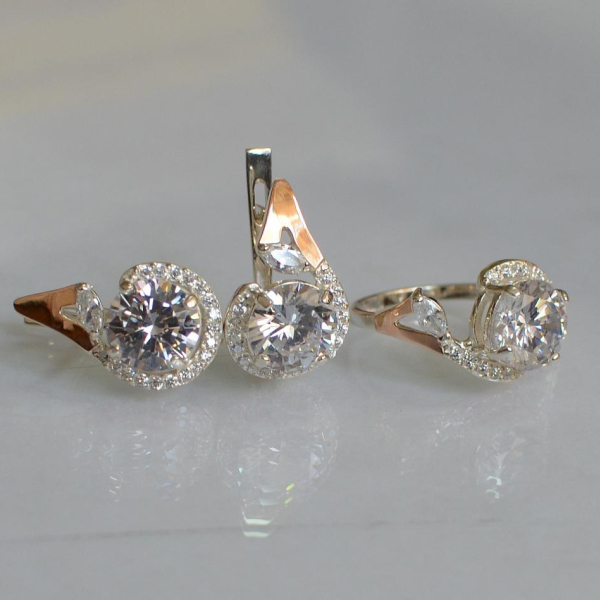 Срібний набір з золотими пластинами