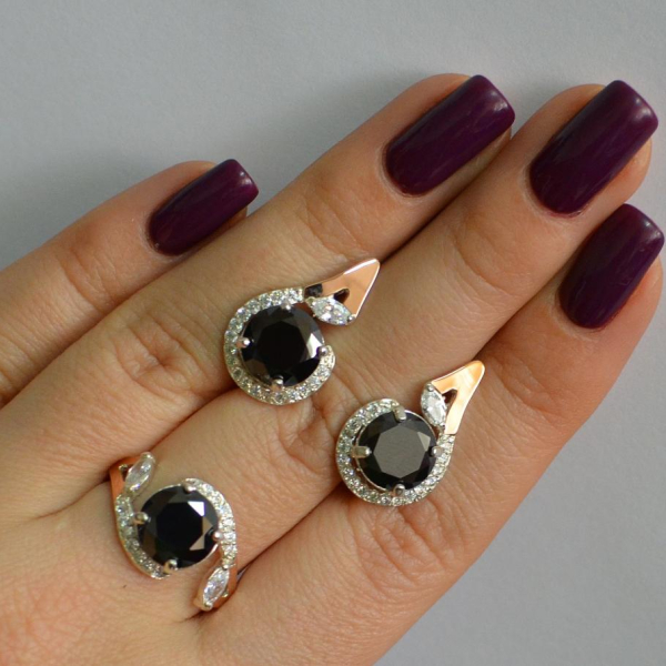 Срібний набір з золотими пластинами