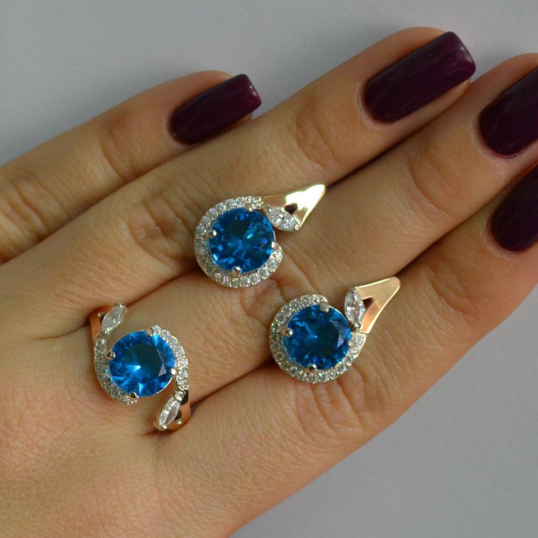 Срібний набір з золотими пластинами