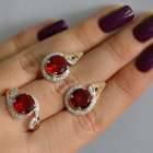 Срібний набір з золотими пластинами