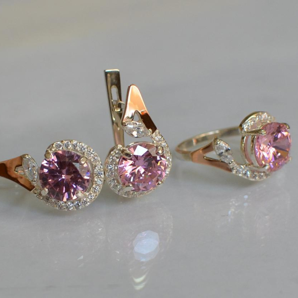 Срібний набір з золотими пластинами