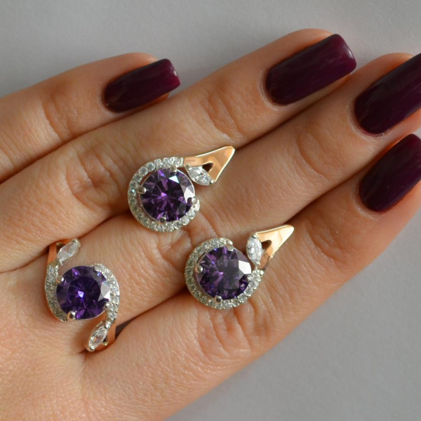 Срібний набір з золотими пластинами