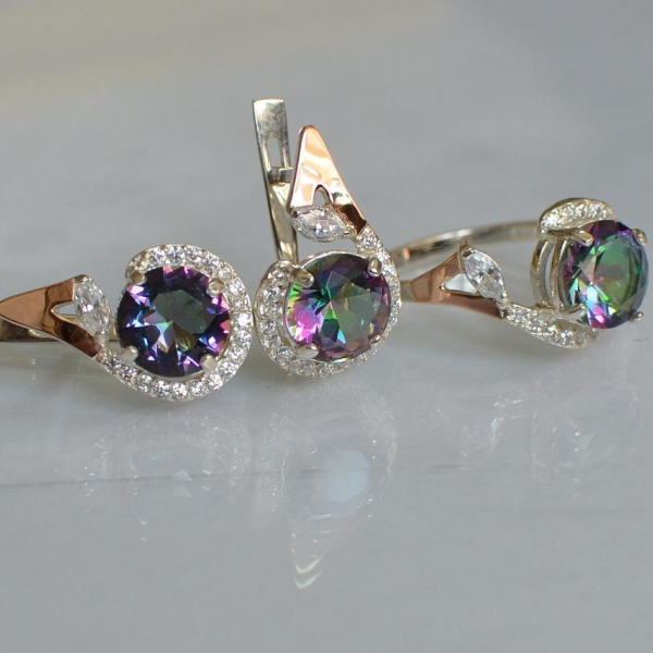 Срібний набір з золотими пластинами