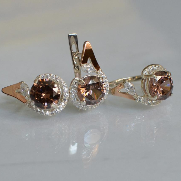 Срібний набір з золотими пластинами