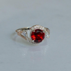 Срібна каблучка з золотими вставками