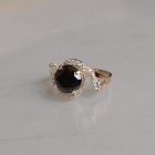 Срібна каблучка з золотими вставками