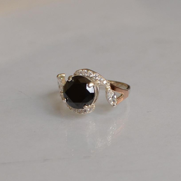 Срібна каблучка з золотими вставками