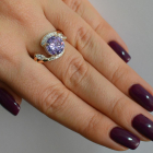 Срібна каблучка з золотими вставками