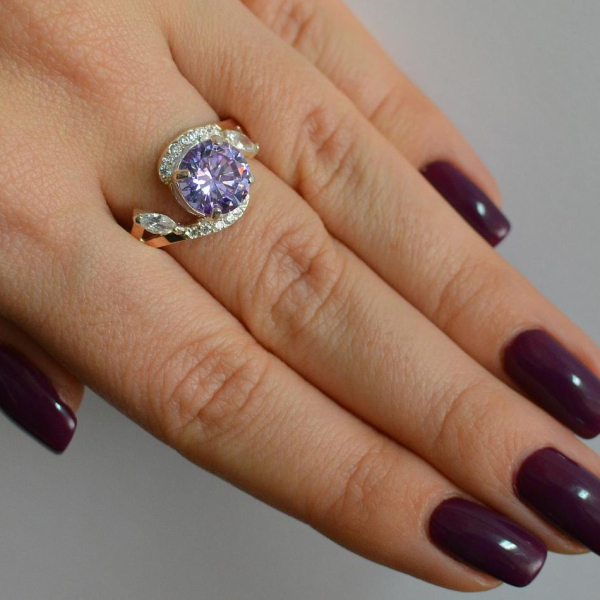 Срібна каблучка з золотими вставками