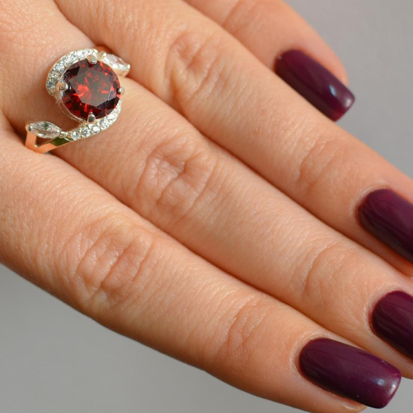 Срібна каблучка з золотими вставками