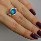 Срібна каблучка з золотими вставками