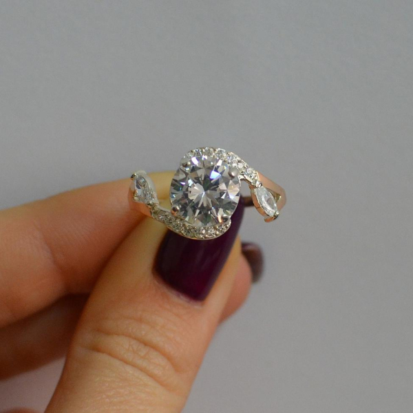 Срібна каблучка з золотими вставками