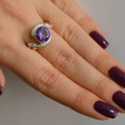 Срібна каблучка з золотими вставками