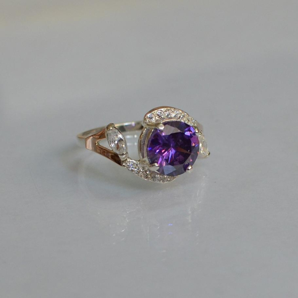 Срібна каблучка з золотими вставками