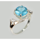 Срібна каблучка з золотими вставками