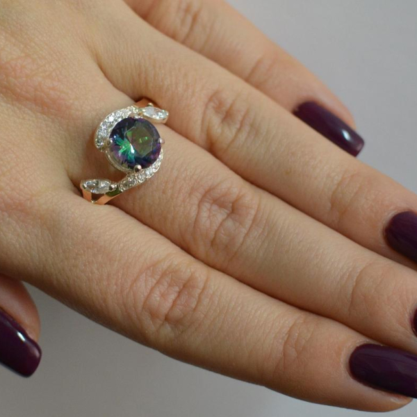 Срібна каблучка з золотими вставками