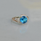 Срібна каблучка з золотими вставками