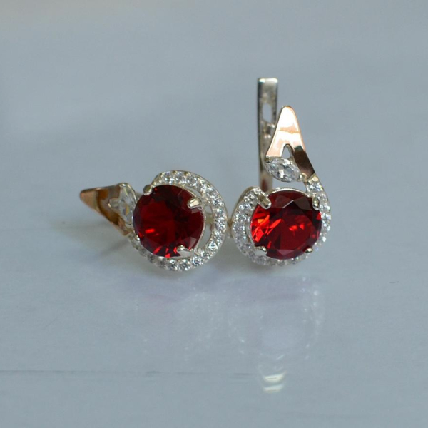 Срібні сережки з золотими вставками