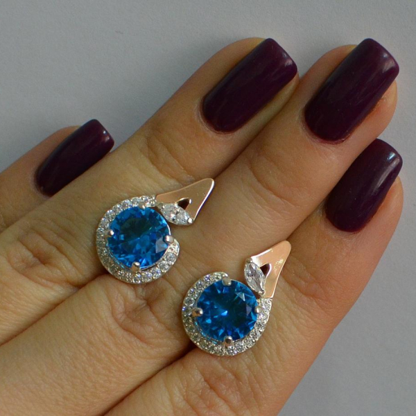 Срібні сережки з золотими вставками