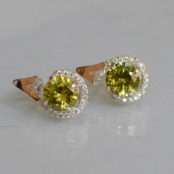 Срібні сережки з золотими вставками