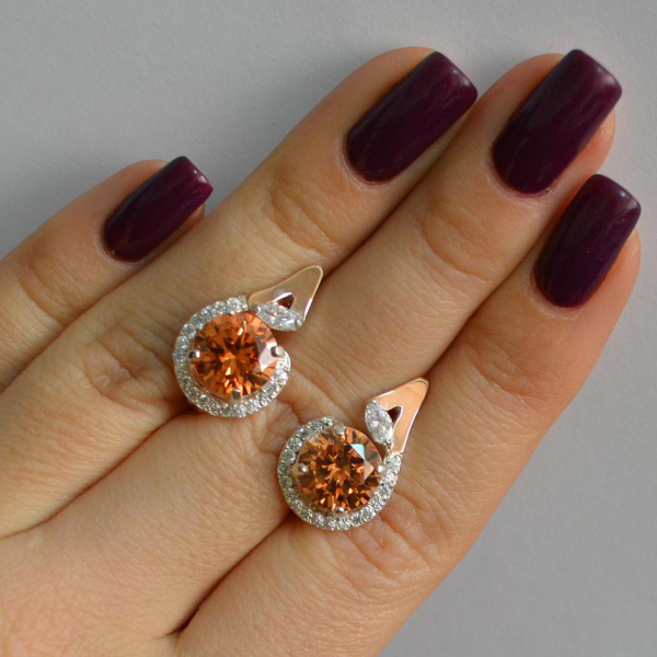 Срібні сережки з золотими вставками