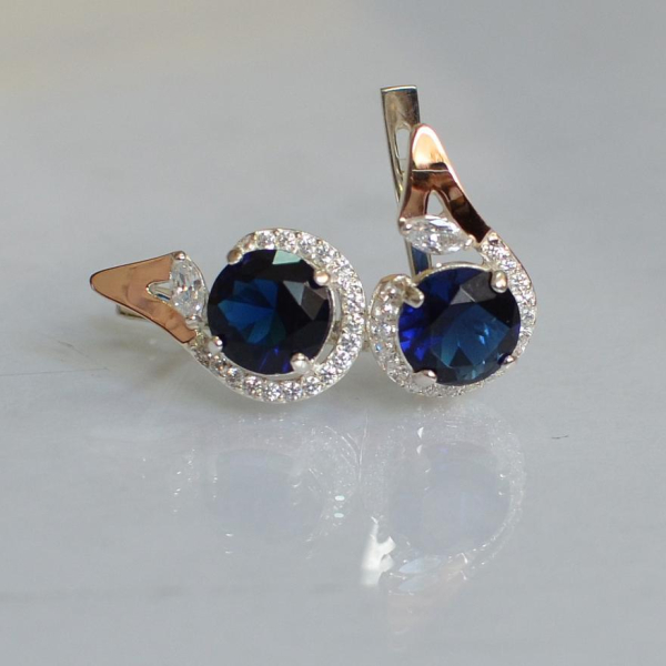 Срібні сережки з золотими вставками