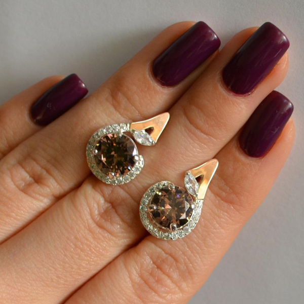 Срібні сережки з золотими вставками