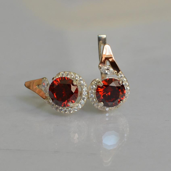 Срібні сережки з золотими вставками