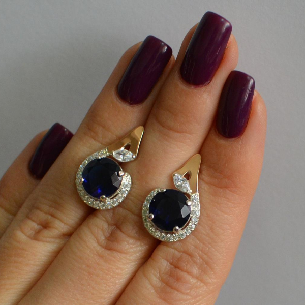 Срібні сережки з золотими вставками